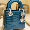 Túi xách Dior Lady Dior cỡ trung màu ngọc lam da cá sấu